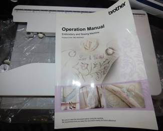 Brother Innovis XV8550D digital embroidery machine with hoops and frames and multiple Floratine embroidery CDs.