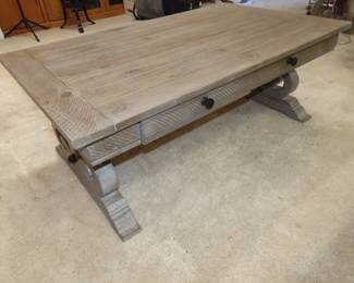 Coffee table with drawers.