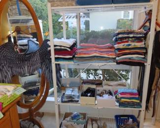 Towel sets, shelves of tee shirts, leggings, new shoes and more.