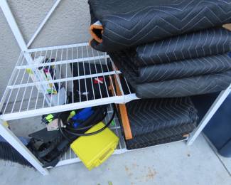 Divers fins and regulator. Moving blankets.