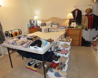 Sleep NUmber bed, ladies shoes, bedding, table lamps, headboard and nightstands.