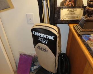 Brand new XL Oreck vacuum and bags.
