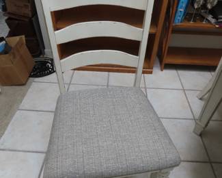 One of six dining chairs.