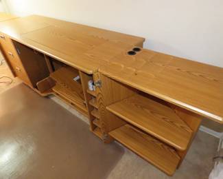 Koala sewing station with multy changing options, drawrs, shelves, power, cutting tables, sewing machine storage.