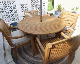 Teak patio table and 4 chairs.