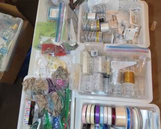Beads, ribbons, jewelry making supplies, threads, sequins, chains.
