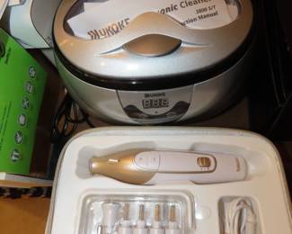 Ukoke ultra sonic jewelry cleaner, electronic nail filer.