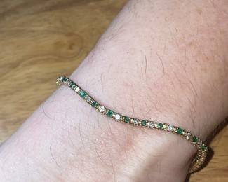 14 karat gold emerald, and diamond bracelet