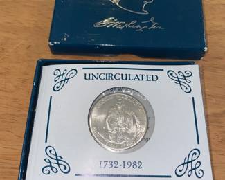 Pair of silver George Washington commemorative half dollars