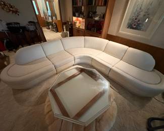 sectional, glass top Hollywood Regency design coffee table.