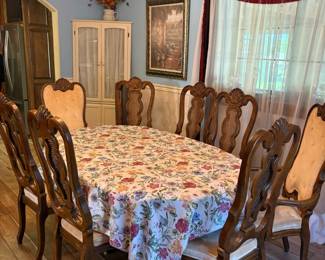 dining table has 2 additional leaves, 8 chairs