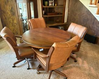 table with 4 chairs and extra leaf--would make a great game table,