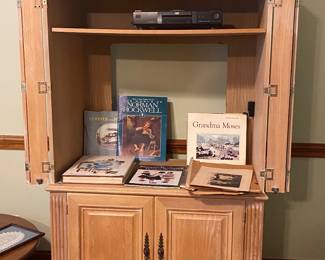 Tv cabinet and coffee table books