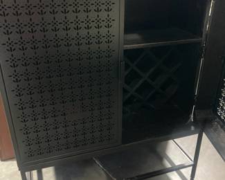 Bar with metal doors and interior wine rack