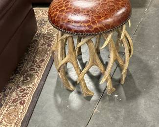 Antler stool with leather seat