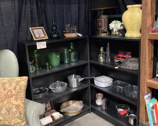 Black bookcases with accessories
