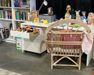White desk with rolling file cabinet, Bamboo chair, bookcases, Beanie Babies, stuffed animals