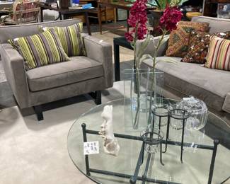 Round glass top coffee table with iron base, Grey contemporary sofa and chair