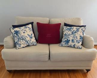 Light Gray Upholstered Loveseat with Chinoiserie and Monogrammed Pillows