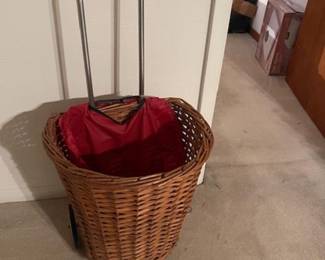 Vintage wicker rolling basket