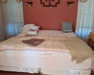 Nice clean king bed, custom comforter, linens