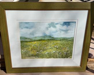 Sandra Blaylock Seifert – Original Landscape Watercolor
Serene original watercolor landscape by artist Sandra Blaylock Seifert, depicting a peaceful wildflower meadow beneath expansive skies and rolling hills. Executed with soft atmospheric washes and delicate natural color, the work reflects Seifert’s international artistic background and refined graphic arts training.
A graduate of Cooper Union in New York City, Seifert worked as an art editor and later Art Director for the New York Herald Tribune, spending decades abroad creating works inspired by the landscapes of her travels before settling in Chattanooga, Tennessee.