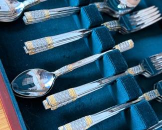 Wallace Corsica gold-accent flatware set — elegant mid-century design featuring refined etched handles with warm gold detailing. Beautifully preserved in original storage case, perfect for entertaining or display. A timeless estate treasure blending classic craftsmanship with sophisticated table appeal.