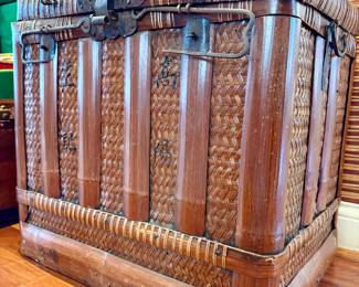 Vintage Bamboo & Woven Rattan Trunk
Striking vintage bamboo trunk featuring hand-woven rattan panels, reinforced wood framing, and original iron hardware with aged patina. A beautiful blend of craftsmanship and function — perfect as a coffee table, blanket chest, or statement storage piece. Timeless organic design ideal for coastal, safari, or collected interiors.