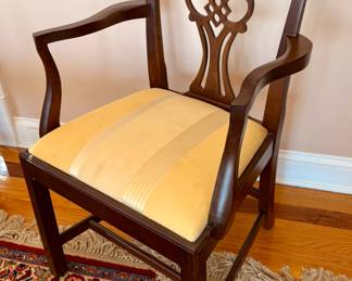 Set of eight Craftique dining chairs including two armchairs, crafted in fine mahogany with classic Colonial Revival styling. Known for superior American craftsmanship and durability, Craftique furniture is highly regarded for quality construction and timeless design. Elegant seating perfect for traditional dining interiors.