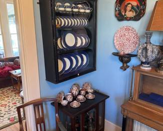 Hanging dresser/display cabinet and antique chocolate cabinet (below)
