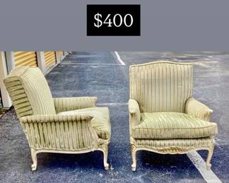 Pr of French carved & Parcel gilt Bergere 