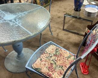 Four piece 1950's cast iron patio set