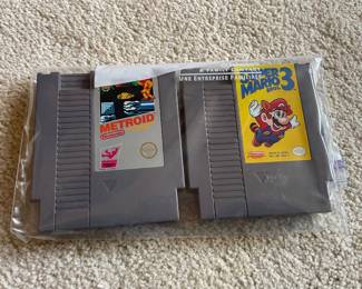 1987 Metroid Nintendo Catridge, 1990 Super Mario Bros. 3 Nintendo Cartridge