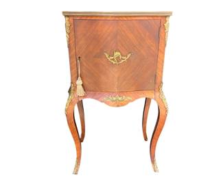 Louis XV style marquetry commode with ormolu accents