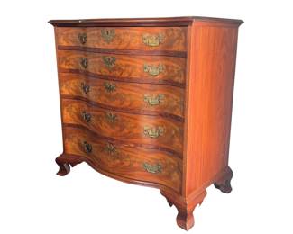 Semi antique Chippendale style mahogany serpentine chest with ogee feet