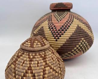 Two traditional handwoven lidded Zulu baskets
