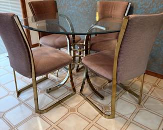 Circa 1970s Hollywood Regency Brass and Glass Dining Set