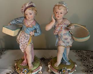 Pair of Circa 1900s Bisque Girls with Baskets Figurines