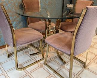 Circa 1970s Hollywood Regency Brass and Glass Dining Set