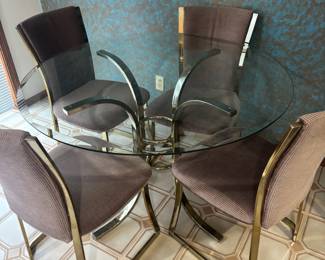 Circa 1970s Hollywood Regency Brass and Glass Dining Set