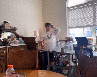 Sharon’s in the middle of going through all the antique hats in this estate