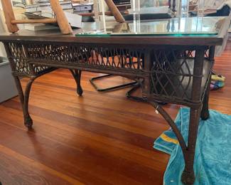 Antique wood top wicker library table