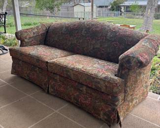 Vintage sofa with floral upholstery 