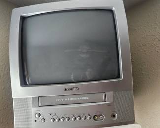 Vintage TV/VCR condo on Wall stand $50