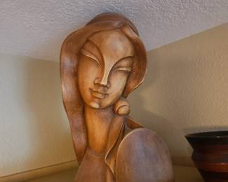 Clay statue of a womans' bust