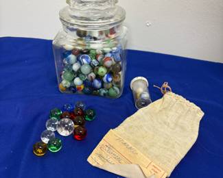 Antique marbles in jar