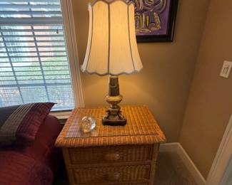 Matching pair of wicker nightstands and brass lamps