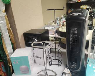Small Safe (new), Lasko Ceramic Element Tower Heater, Toilet Paper Holder, Towel Holder