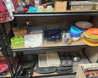 Plastic ware, metal mixing bowls, apple peeler, skillets, cast iron, bake pans and more
