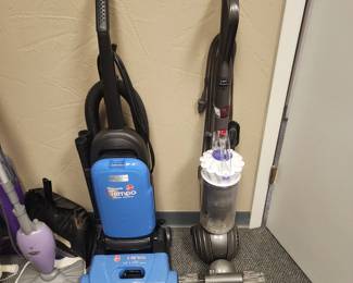 Hoover Vacuum and a Dyson Vacuum